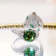 Elegant diamond panther ring with green gemstone