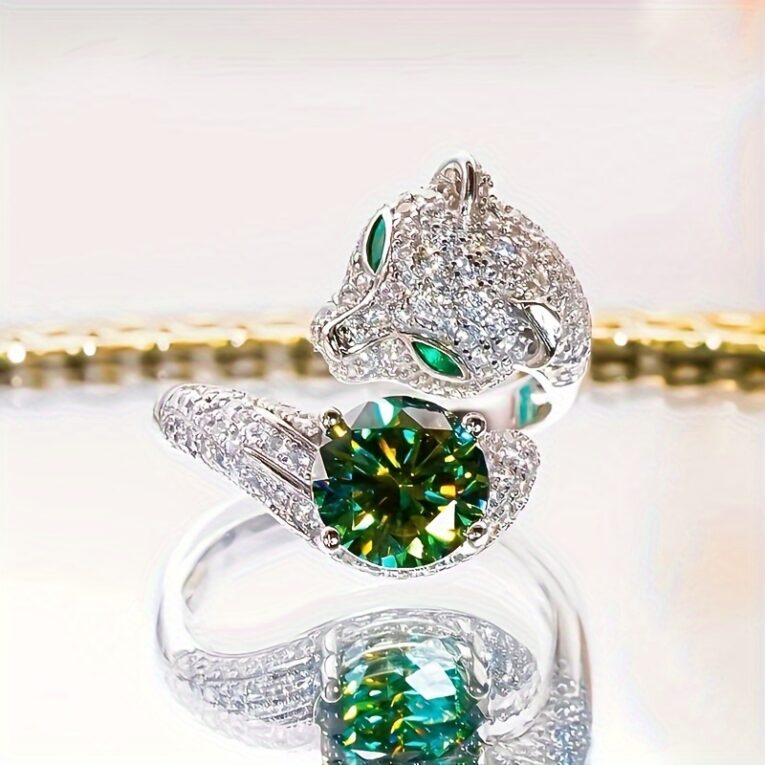 Elegant diamond panther ring with green gemstone